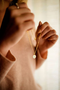 handstamped gold necklace